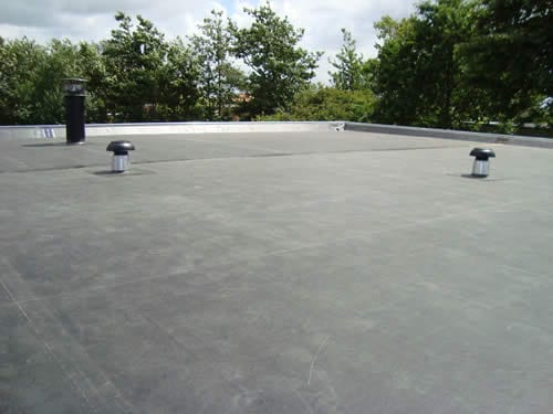 What does roofing cost flat roofing?